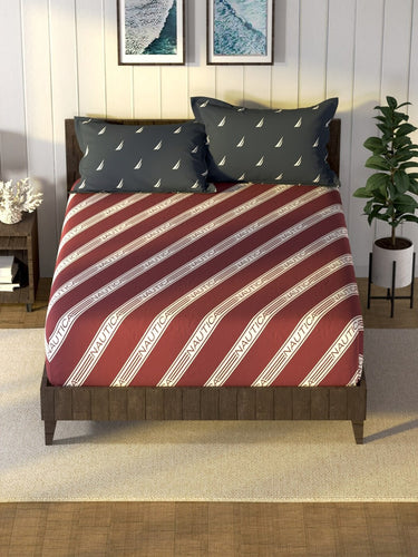 https://cdn.shopify.com/s/files/1/1857/6931/products/1d6a8129-0a9b-49ee-b7d4-74b07d7b506d1694270377702NauticaRedWhiteStriped160TCKingBedsheetwith2PillowCovers2.jpg?v=1703164079